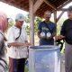 Hari Tani Nasional, DPC PDIP Lampung Tengah Sosialisasi Pupuk Organik Dan Santap Sate Legendaris